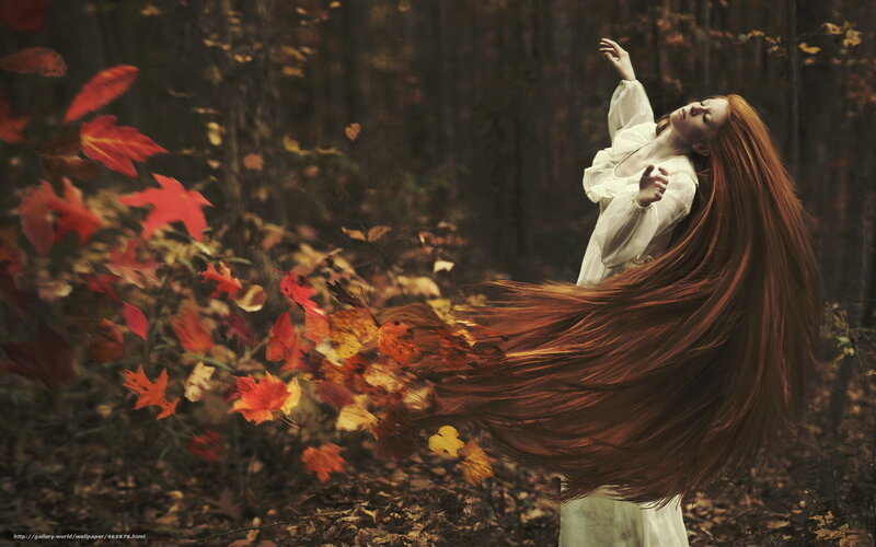 Woman in autumn forest