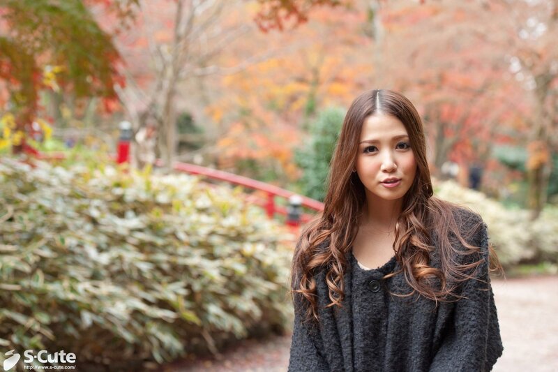Woman in autumn garden