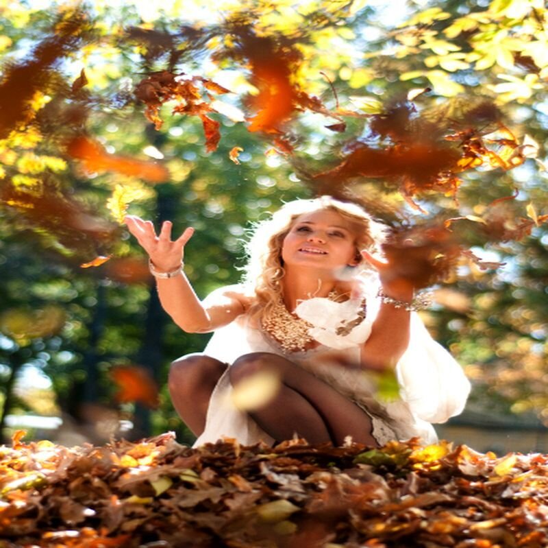 Woman in Autumn Leaves — Brown