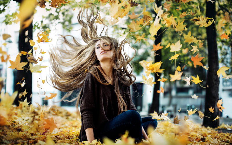 Woman in Autumn Leaves — Yellow, Serene, Photograph