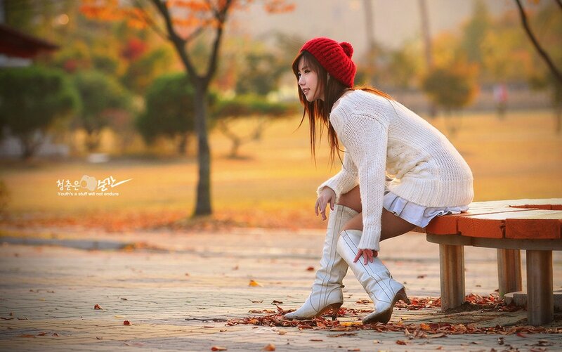 Woman in autumn park