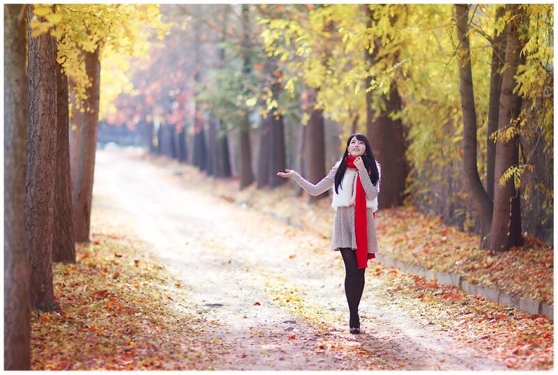 Woman in autumn park