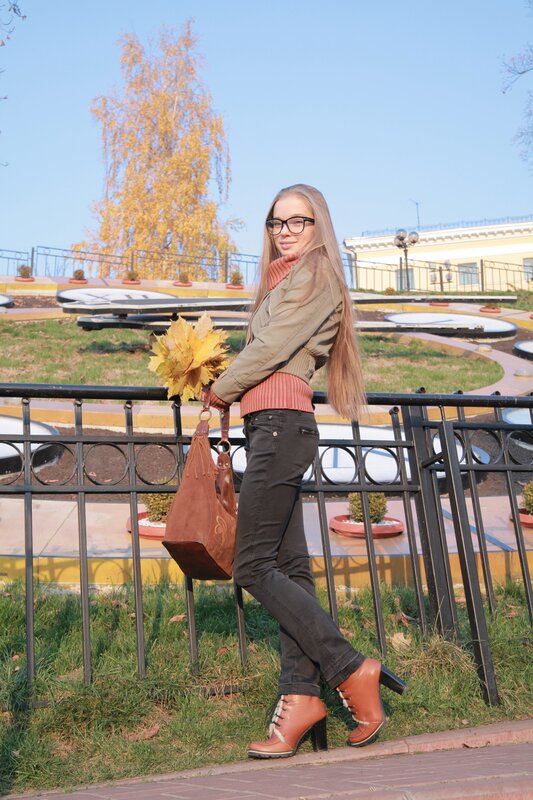 Woman in autumn park