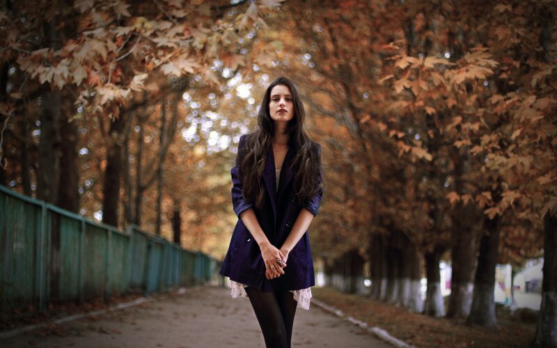 Woman in autumn park