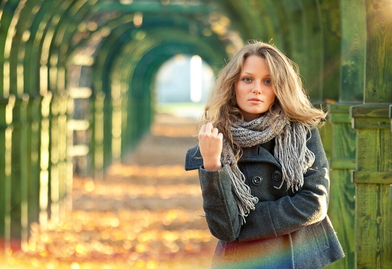woman in autumn tunnel