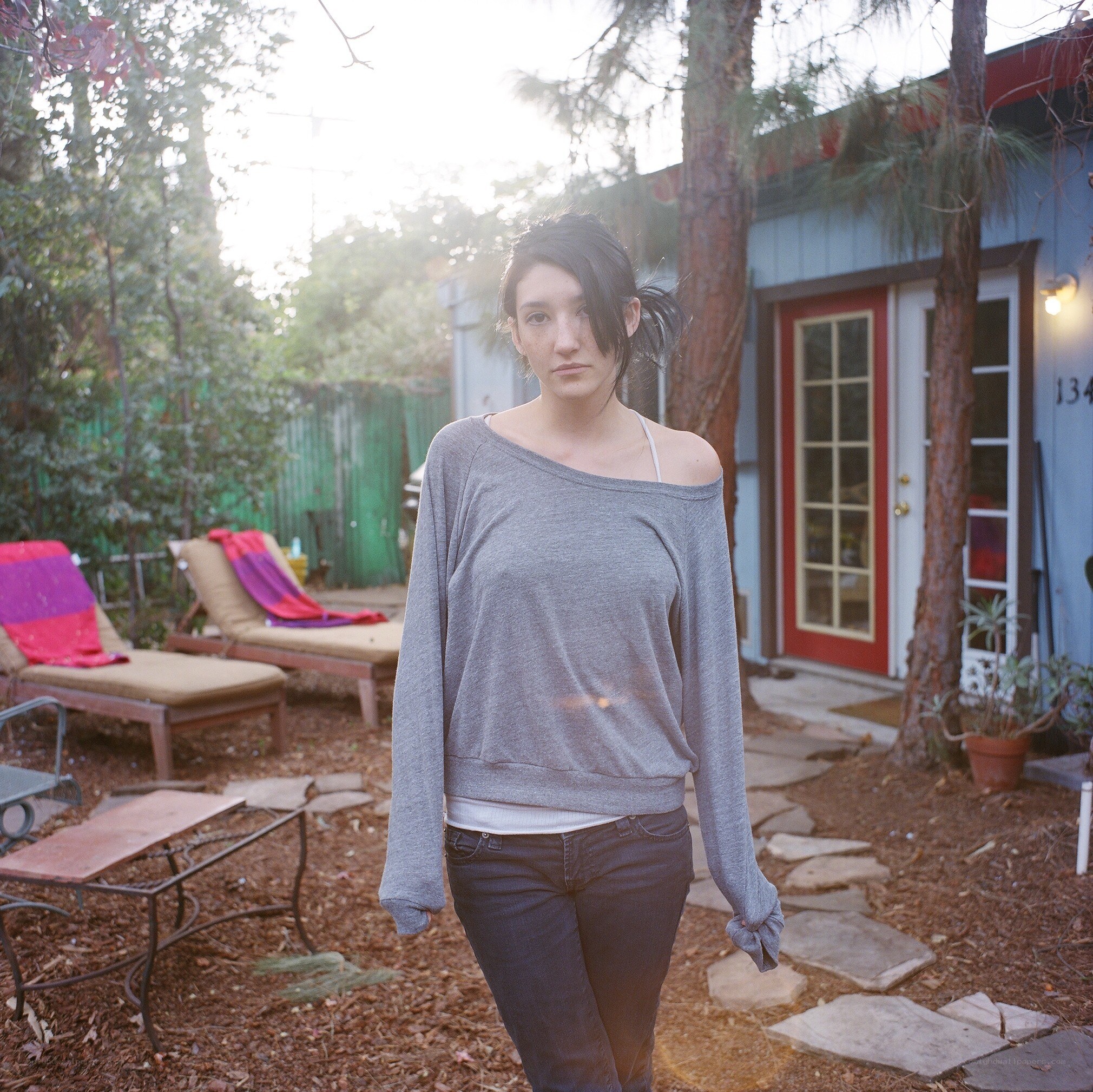 woman in backyard at sunset