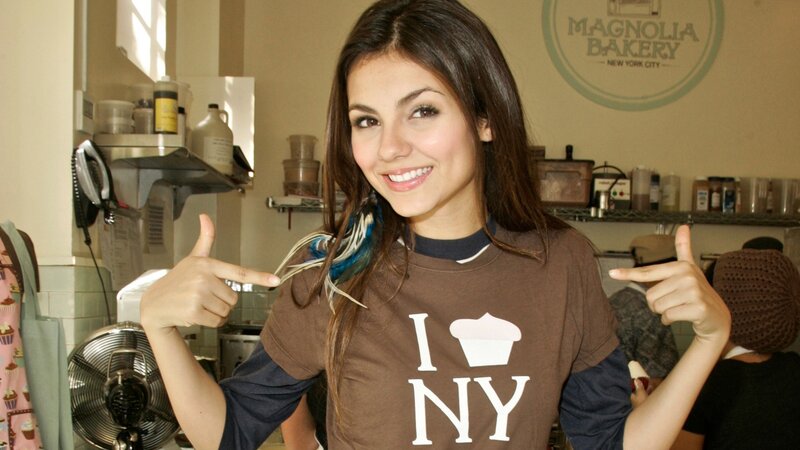woman in bakery with I love NY shirt