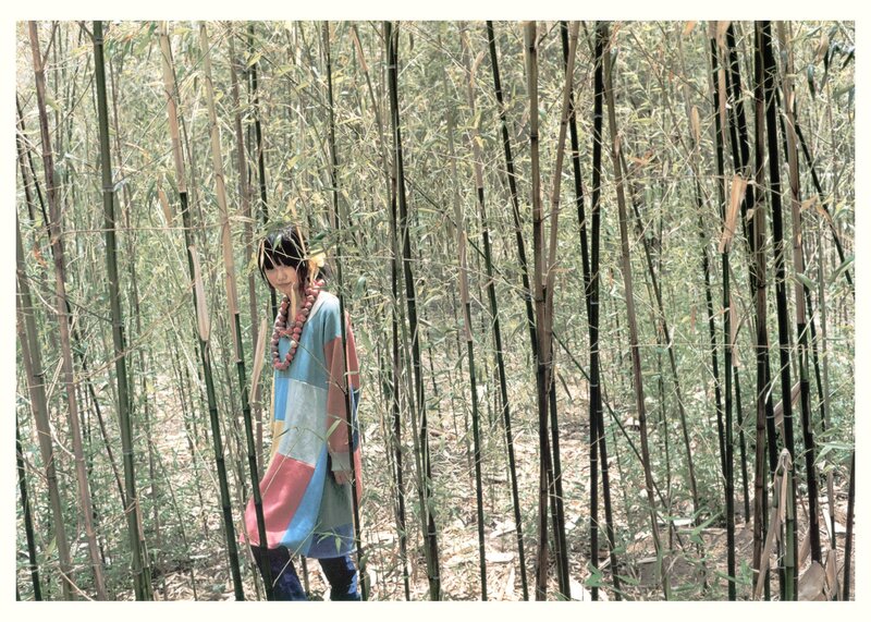 Woman in bamboo forest