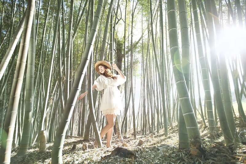 Woman in bamboo forest