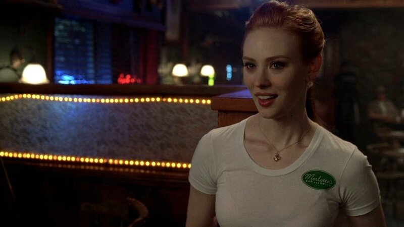 woman in bar uniform