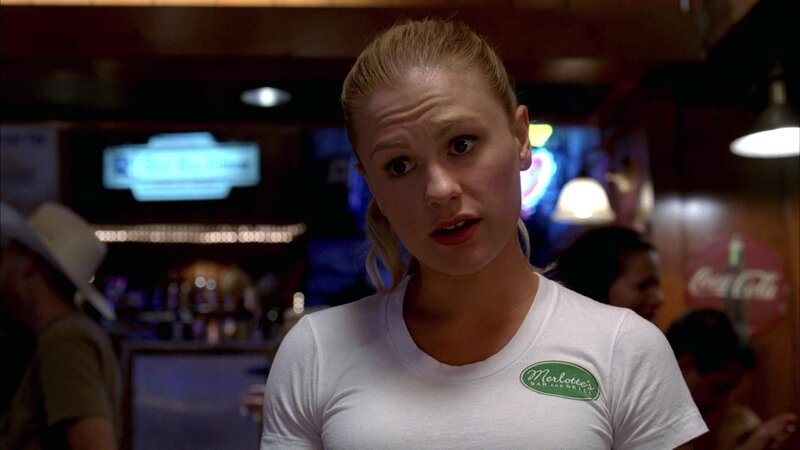 woman in bar uniform