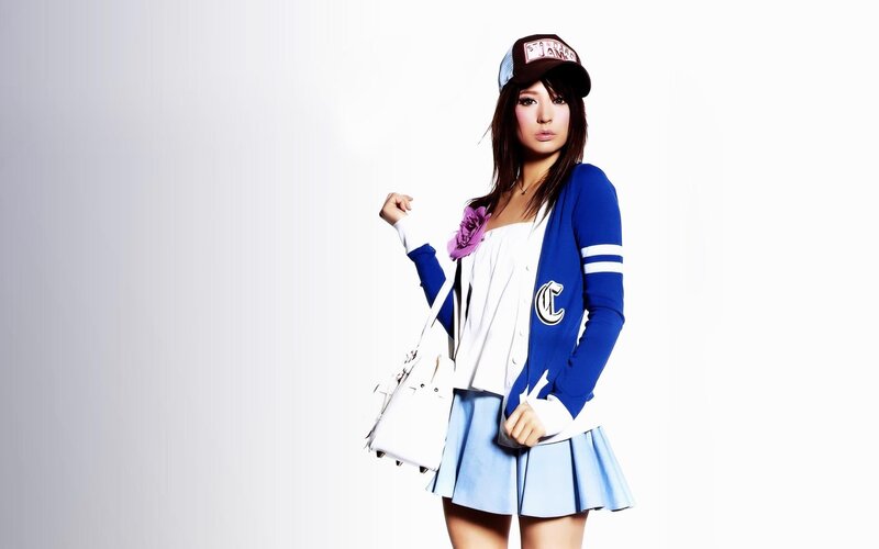 Woman in Baseball Outfit — Blue, Confident