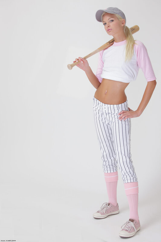 woman in baseball uniform