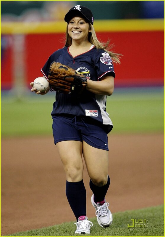 woman in baseball uniform