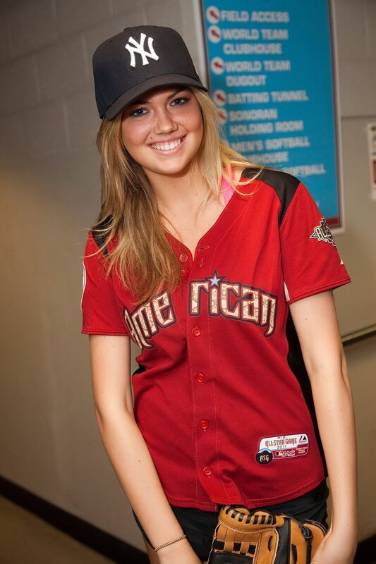 Woman in baseball uniform