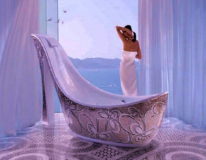 woman in bath with sea view