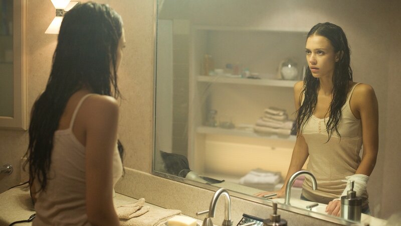 woman in bathroom mirror