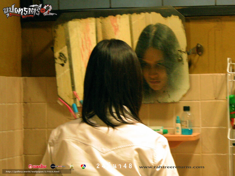 woman in bathroom mirror