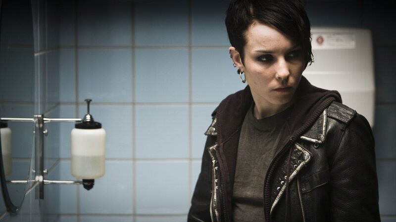 woman in bathroom wearing leather jacket