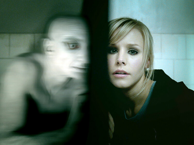 woman in bathroom with ghostly figure