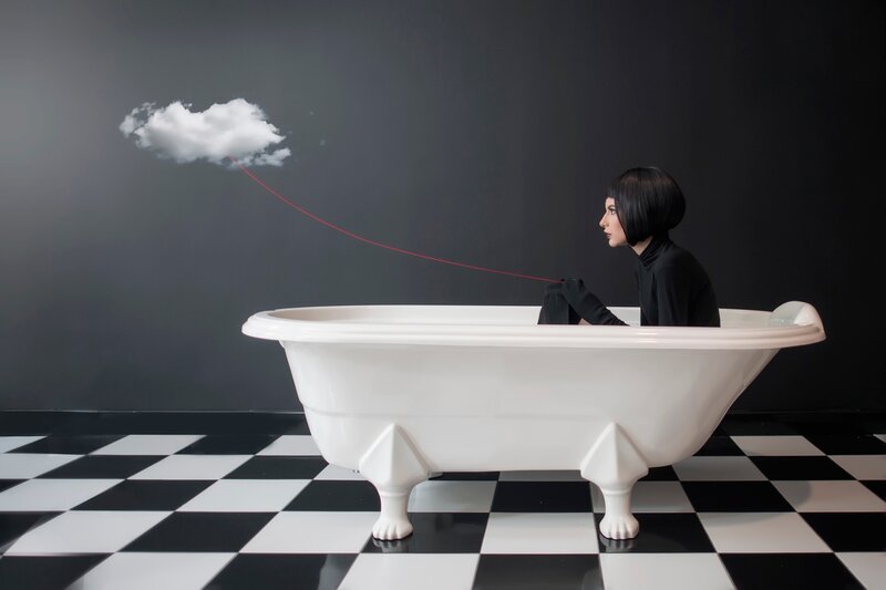 Woman in Bathtub — Black, Dramatic, Photograph, Cloud