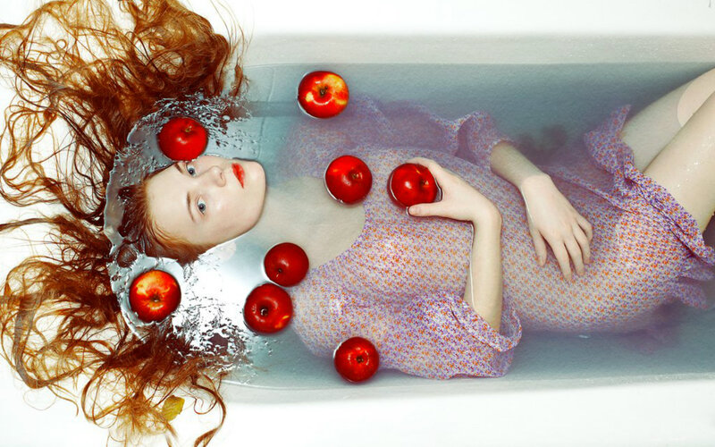 Woman in Bathtub with Apples