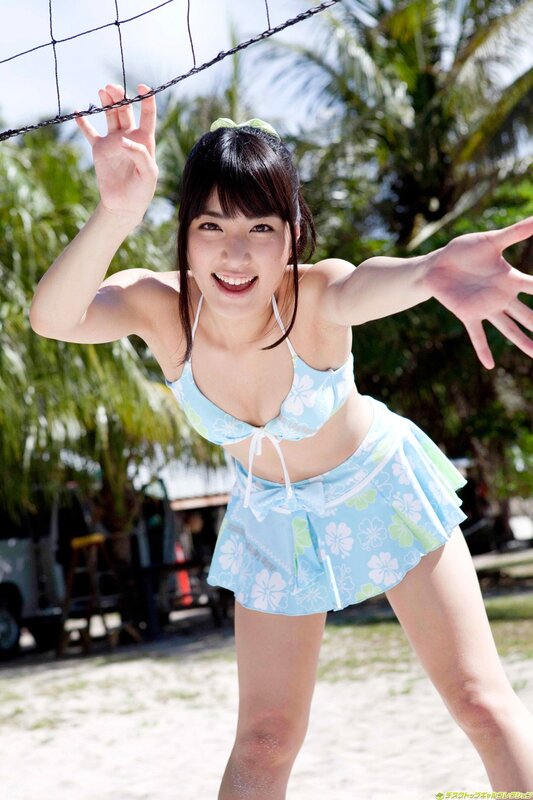 woman in beachwear on sand