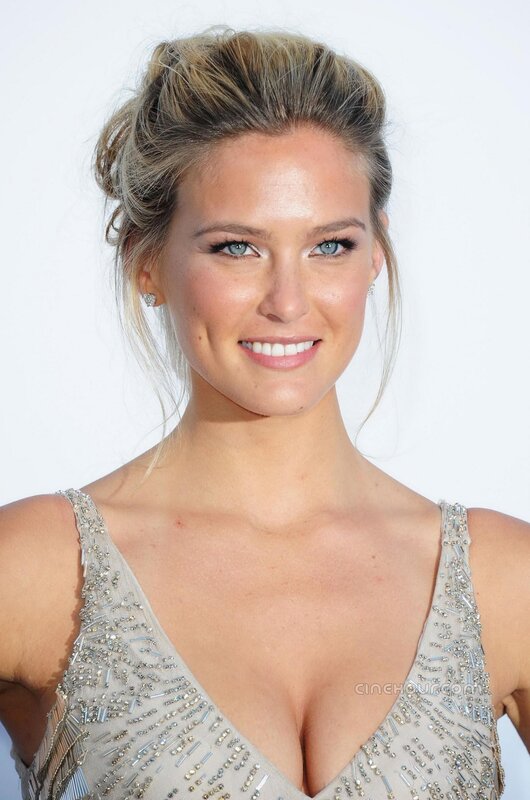 woman in beaded dress smiling
