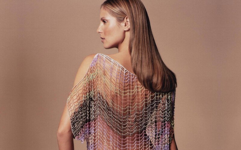 woman in beaded garment