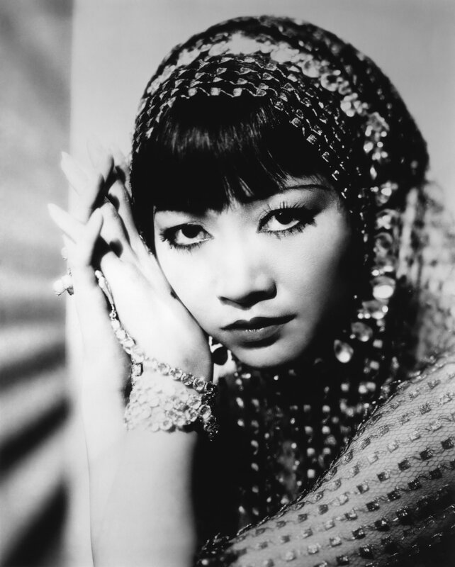 woman in beaded headwear