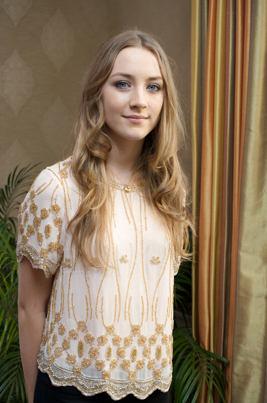 woman in beaded top