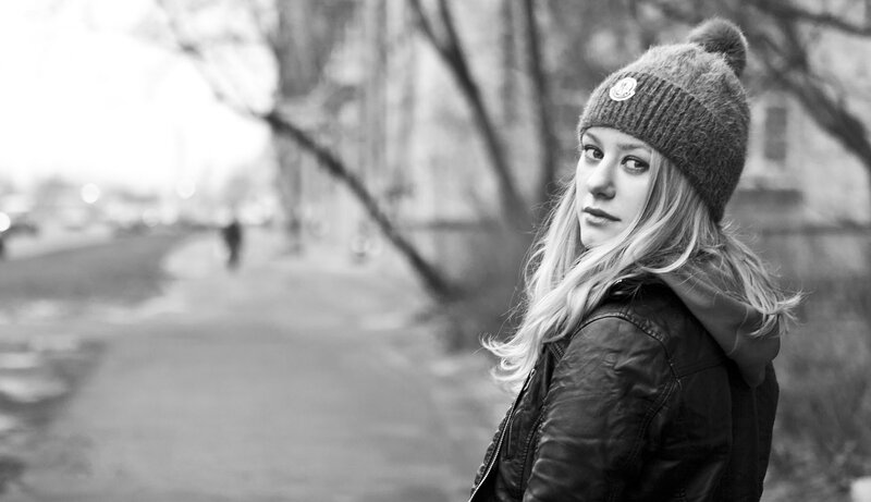 Woman in Beanie and Jacket — Black
