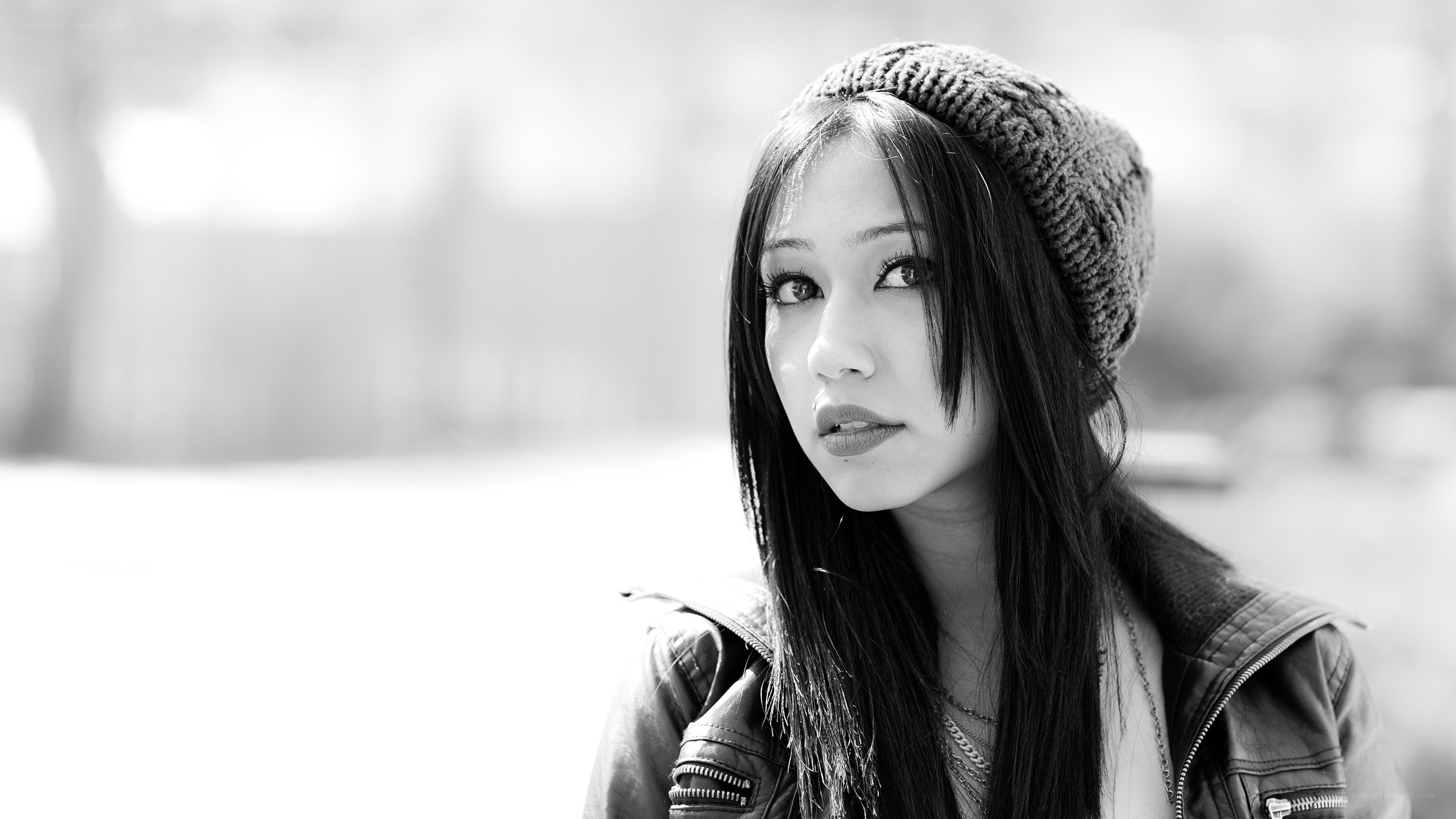 woman in beanie and jacket