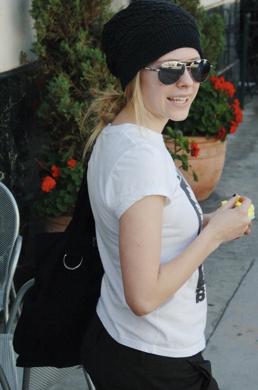 woman in beanie and sunglasses