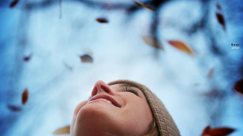 Woman in Beanie Looking Up — Blue