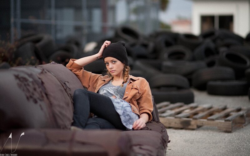 woman in beanie on couch