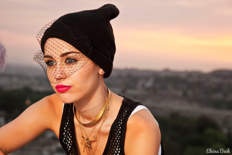 woman in beanie with veil