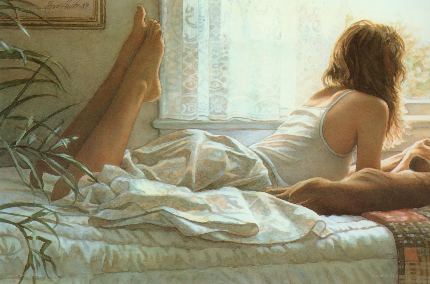 woman in bed by window