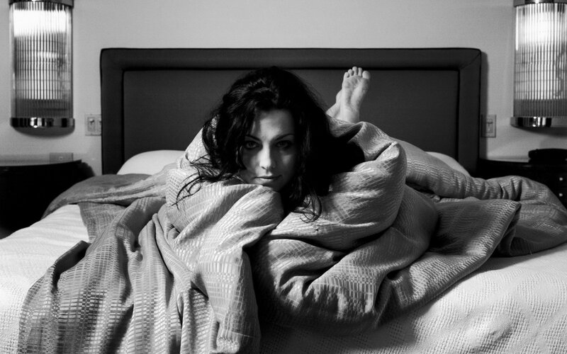 Woman in Bed under Blanket — Black