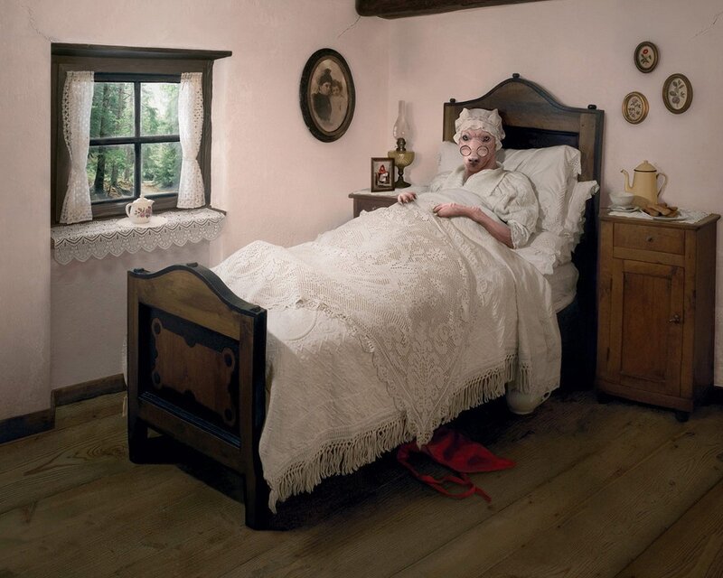 woman in bed with animal mask