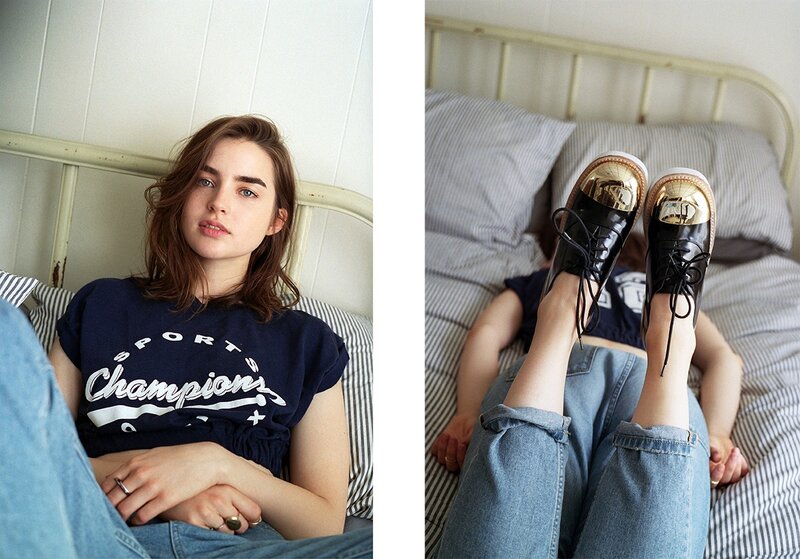 woman in bed with shoes