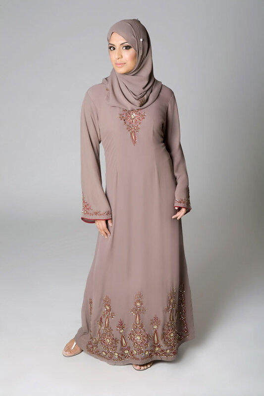 woman in beige abaya