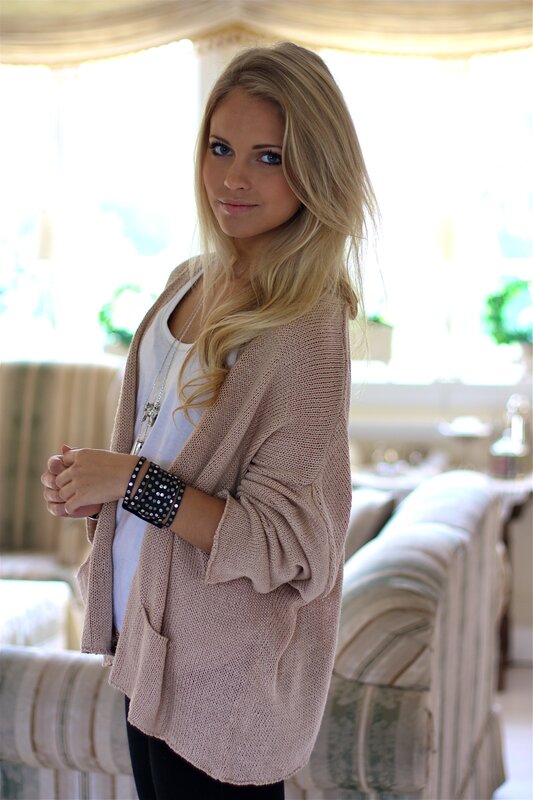 woman in beige cardigan