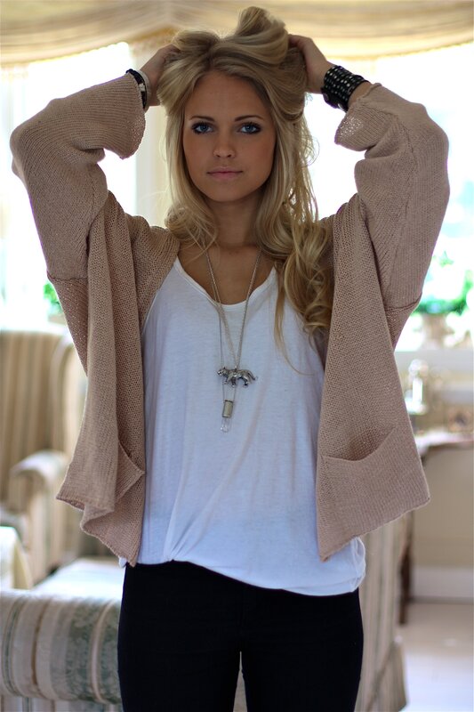 woman in beige cardigan