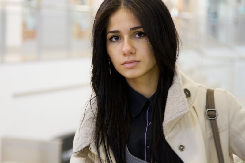 woman in beige coat