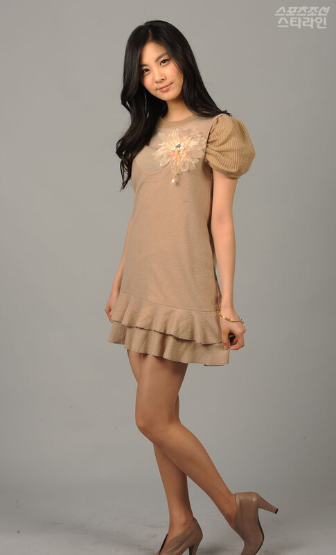 woman in beige dress