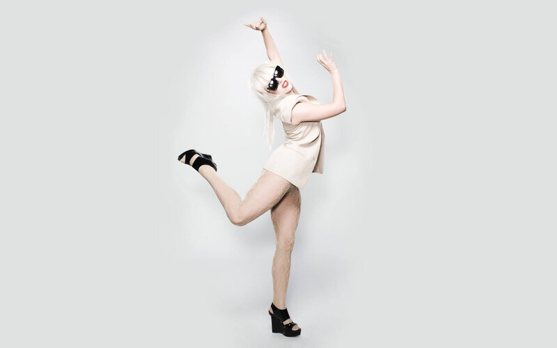 woman in beige dress posing
