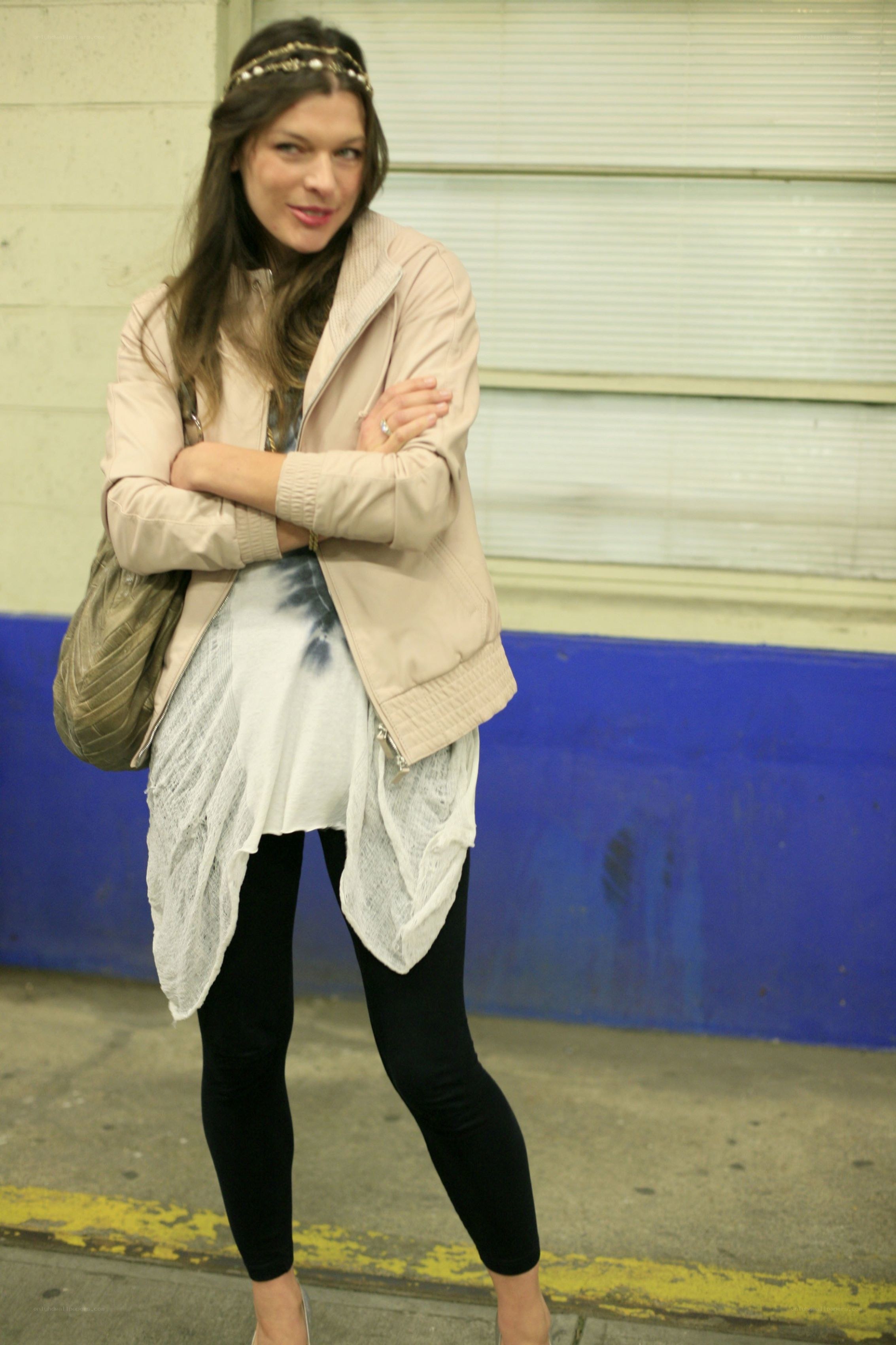 woman in beige jacket