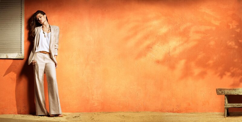 Woman in Beige Suit — Orange, Dramatic