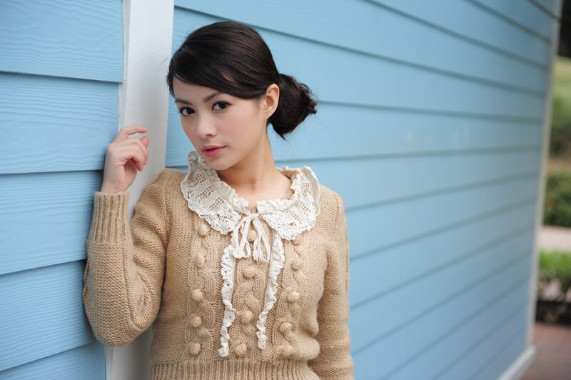 woman in beige sweater